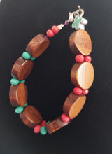 Load image into Gallery viewer, BRACELET FAUX WITH DISC WOODEN BEADS + TURQUOISE SMALTO CROSS AND MULTIFACETED CRYSTALS IN CORAL+TURQUOISE COLOURS
