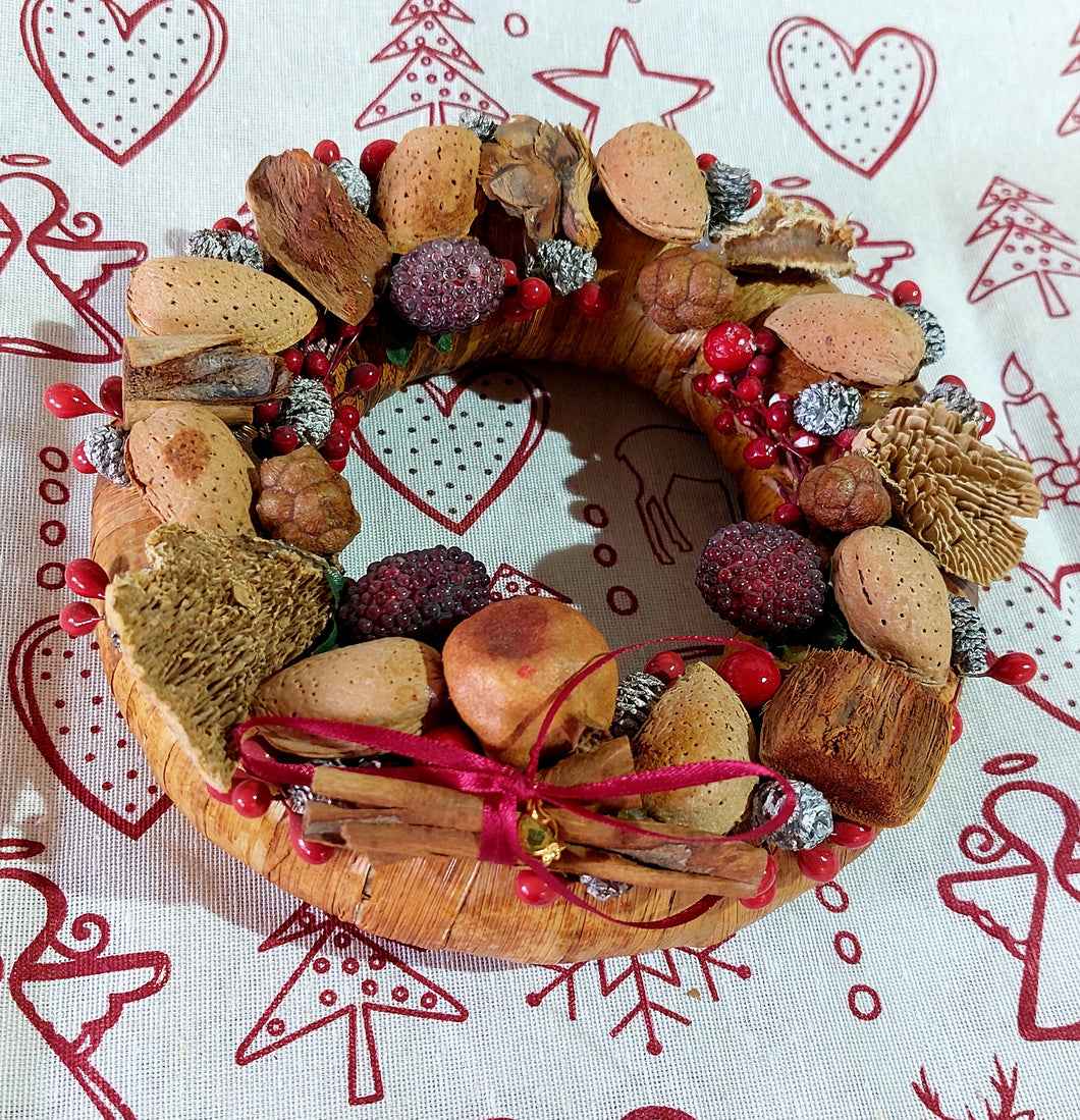 SEASON'S WRETH OR CHRISTMAS DECORATION WITH DRIED PLANTS AND WITH CINNAMON + DRIED SEEDS AND FLOWERS